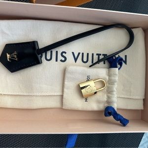 Louis Vuitton clochette, lock and keys.